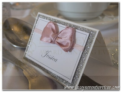 Handcrafted place cards with glitter and satin bows ~ romantic and elegant wedding stationery
